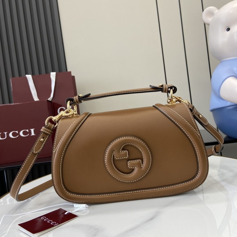 G*u*i top handle bags